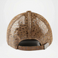 Brown leather cap with perforated design 