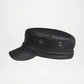 Black leather cap on a white background