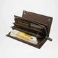 Brown wallet with money and cards