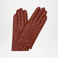 Pair of Brown quilted gloves on a light gray background