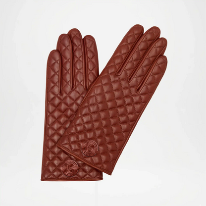 Pair of Brown quilted gloves on a light gray background