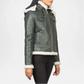 Green leather jacket with white fur trim on a white background