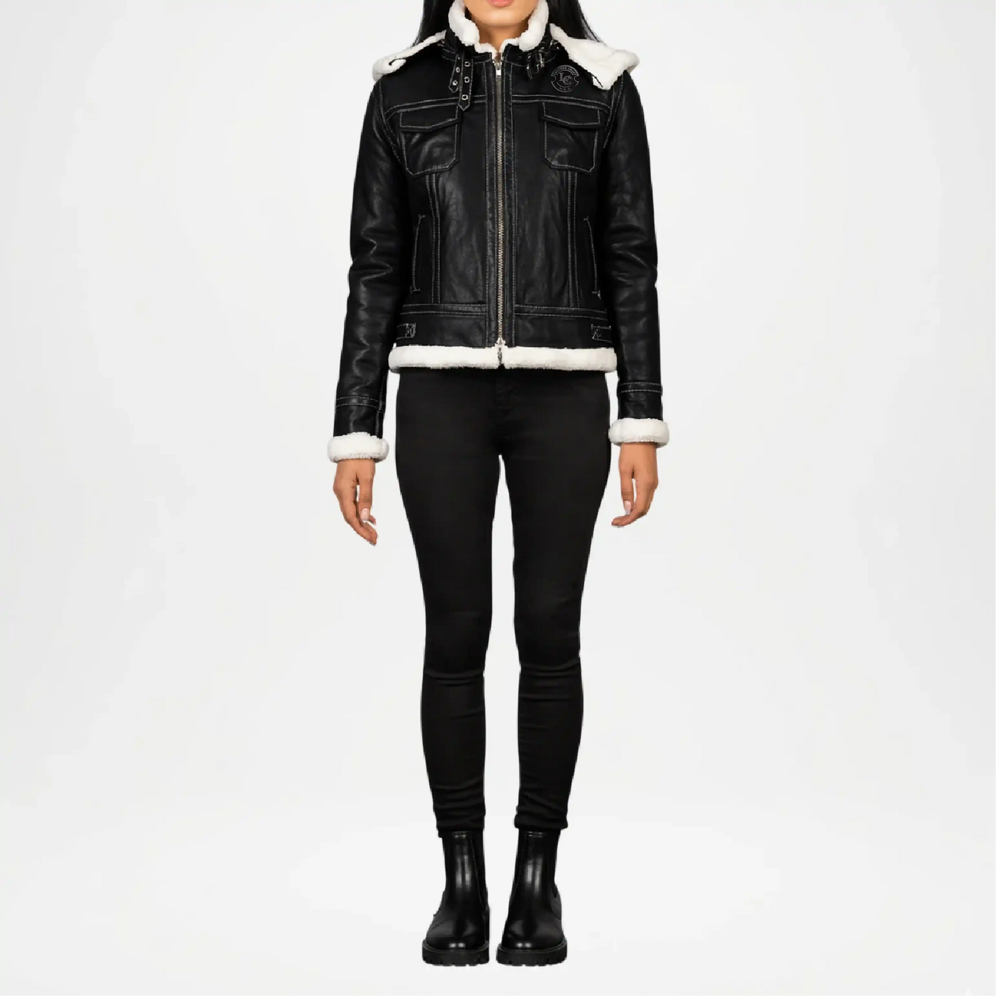 Black leather jacket with white fur lining worn by a person on a white background