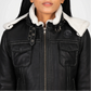Black leather jacket with white fur lining on a plain background