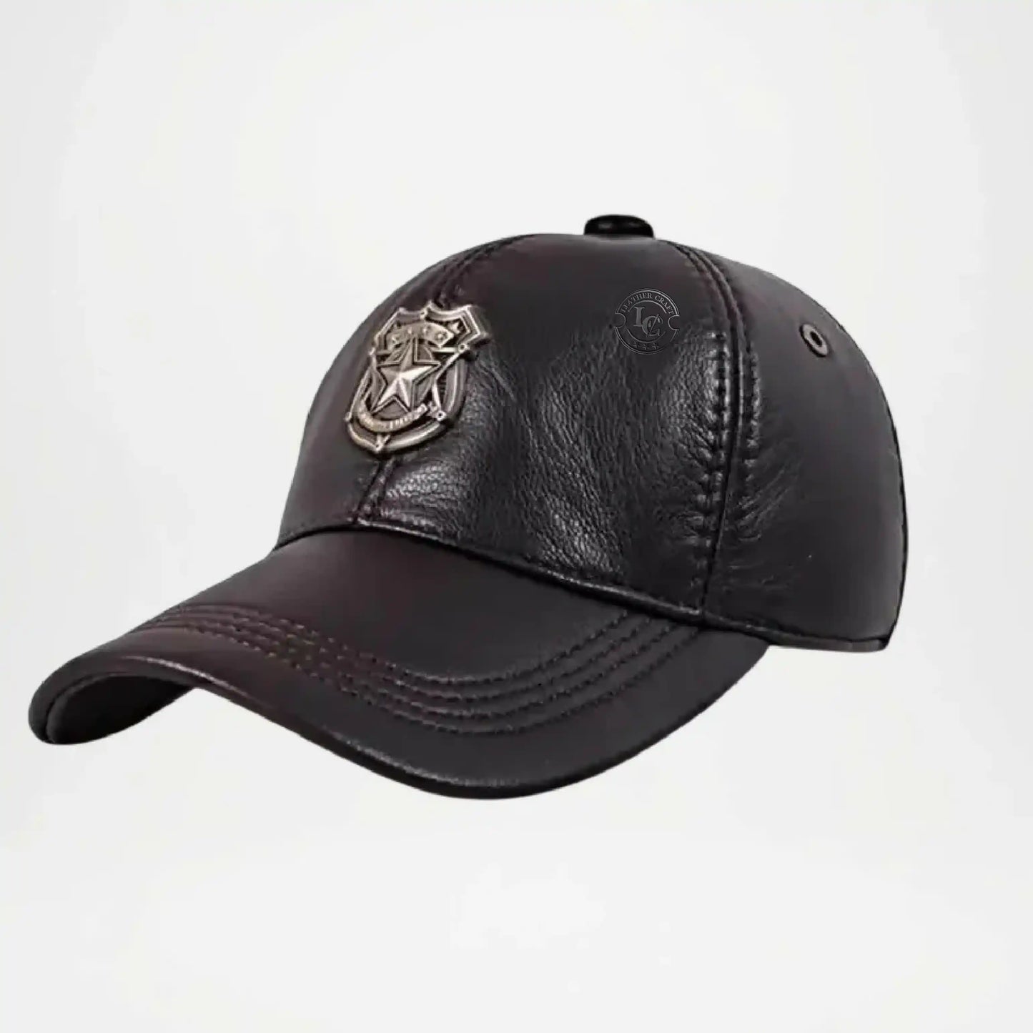 Black leather cap with a metallic emblem 