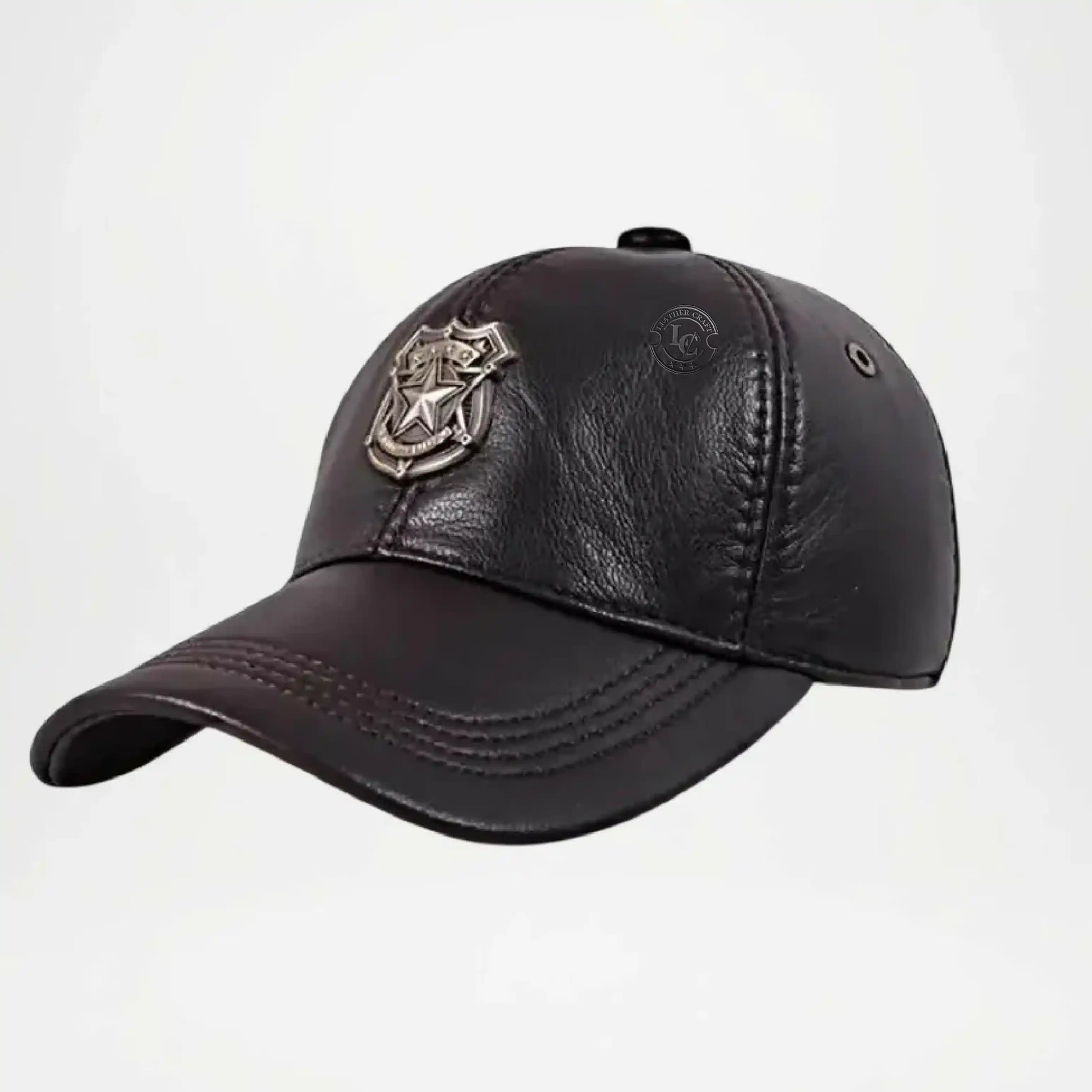 Black leather cap with a metallic emblem 