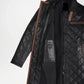 Black quilted coat with brown leather accents 