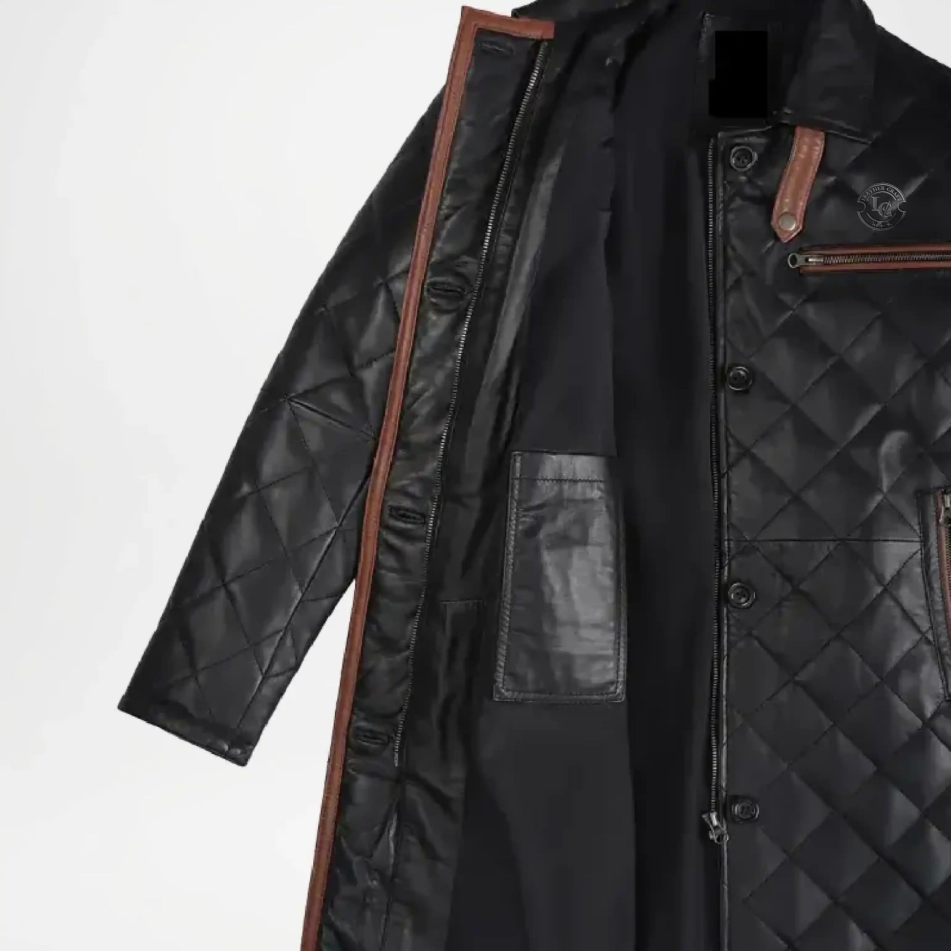 Black quilted coat with brown leather accents 