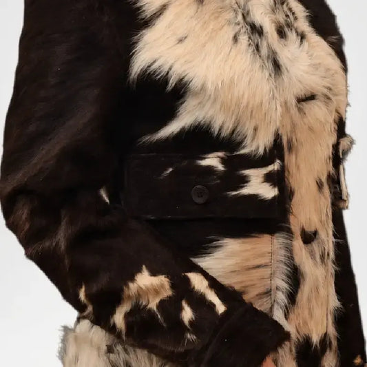 brown & white cowhide jacket women close up
 