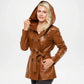 Woman wearing a brown leather coat with a hood 