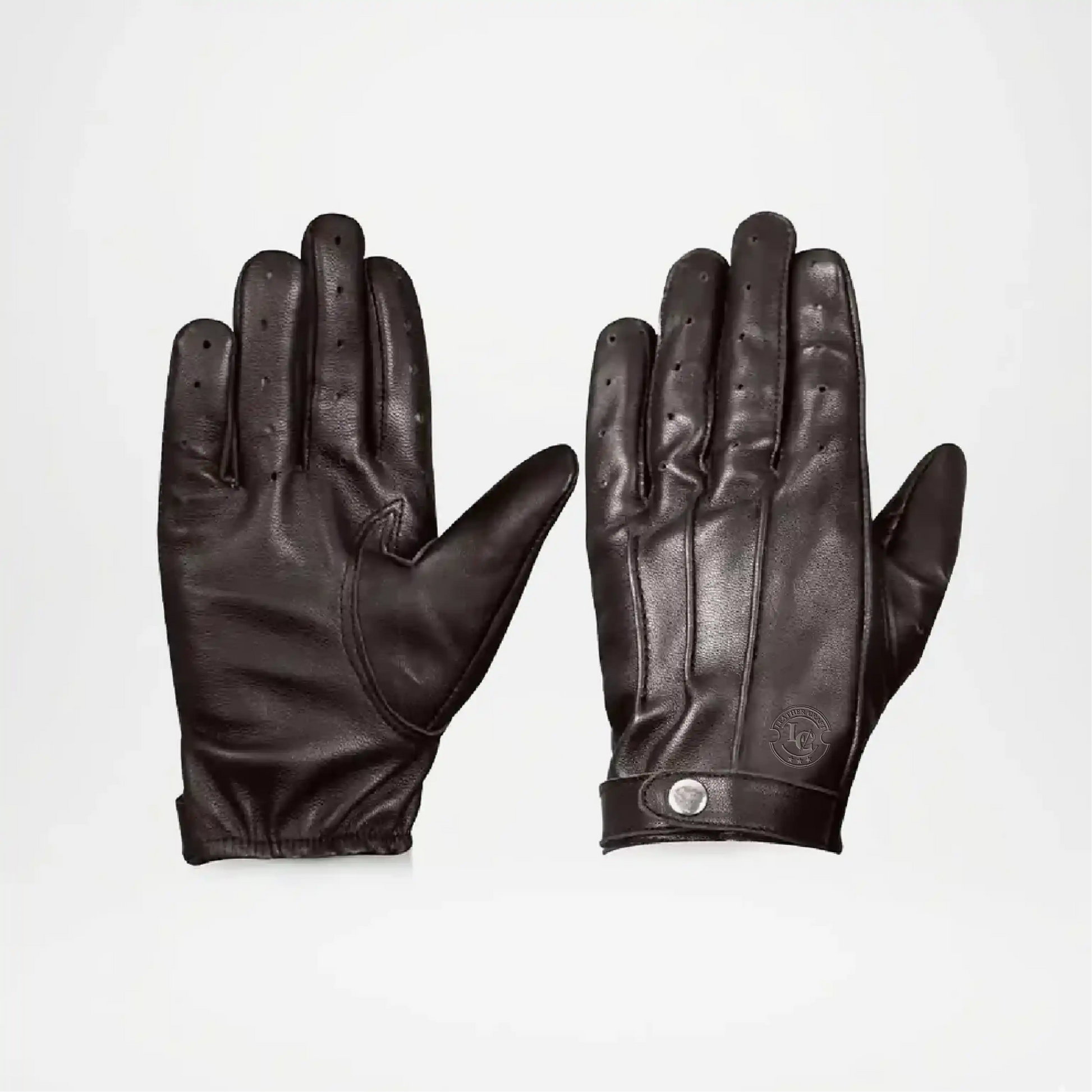 Pair of black leather gloves Strap Closure For Men on a white background