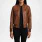 Brown leather jacket worn by a person on a white background