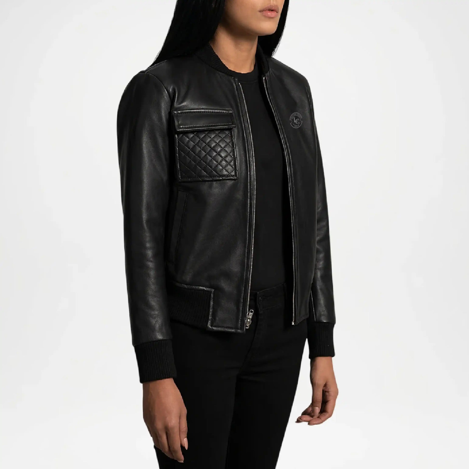Black leather jacket worn by a person on a white background