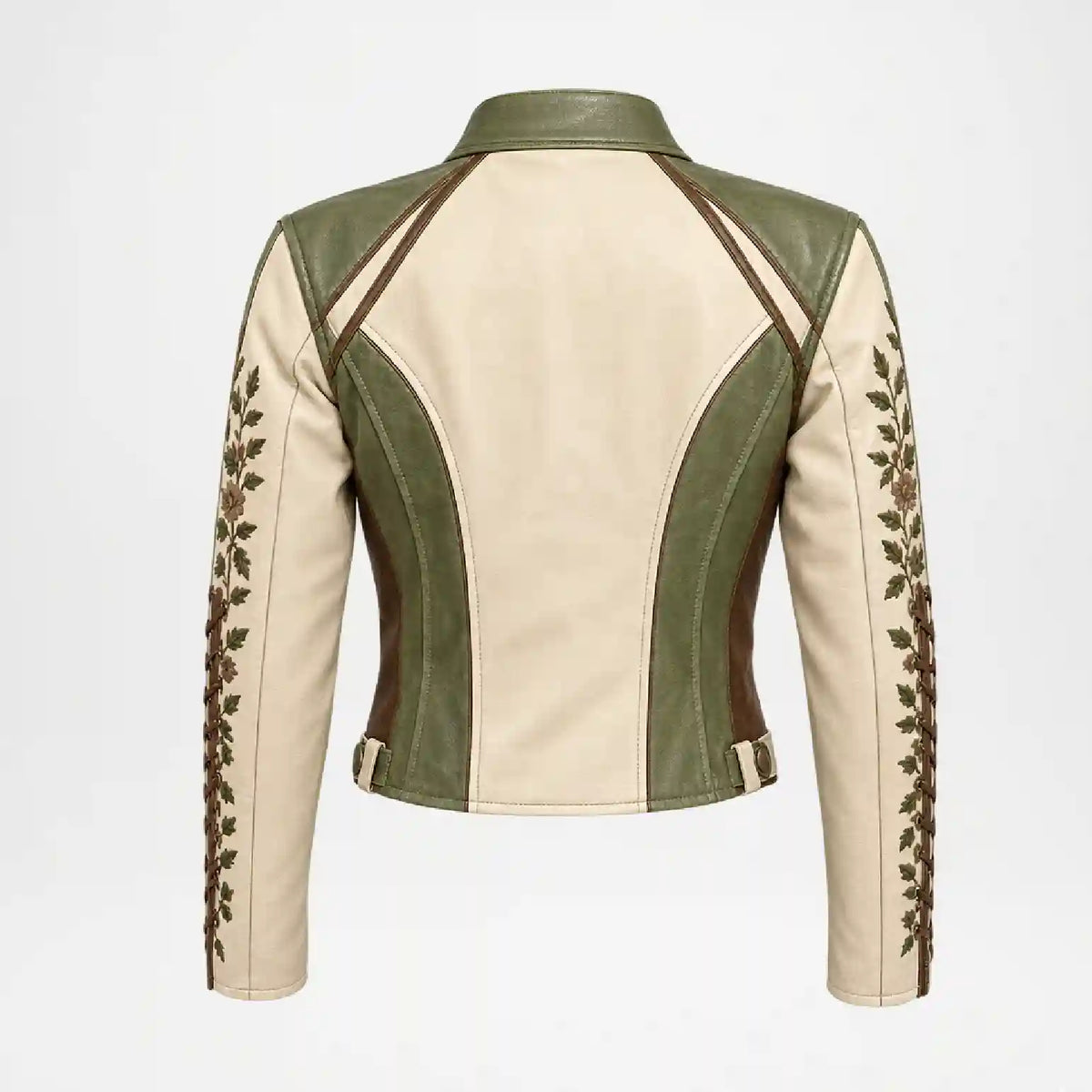 A cropped leather jacket shown from the back, featuring a color-blocked design with beige and olive green panels, and embroidered leaf patterns down the sleeves.