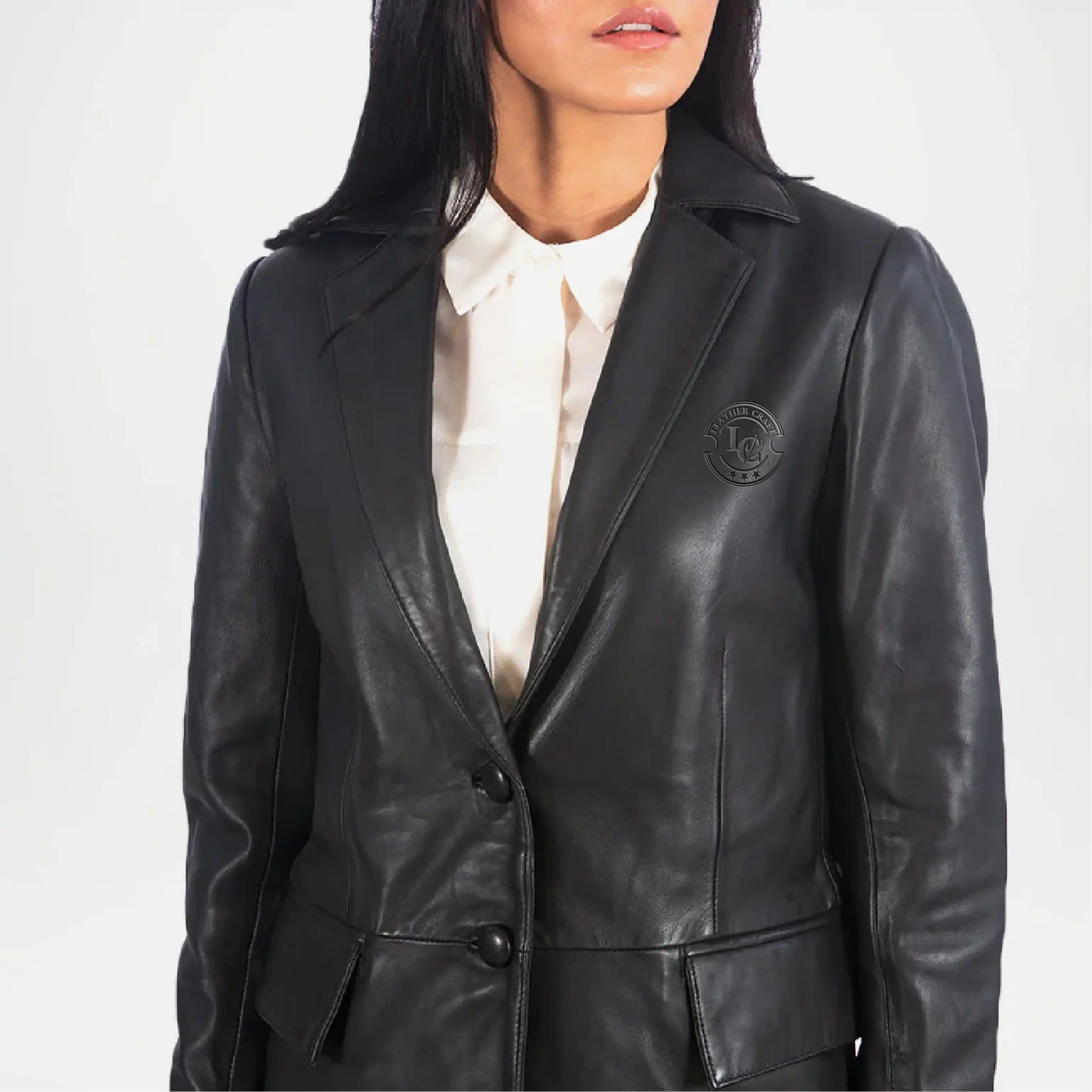 Black leather jacket worn by a person on a white background