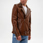 Brown leather jacket with studs on a white background