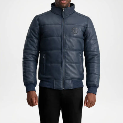 Man wearing a blue puffer jacket with a brand logo 
