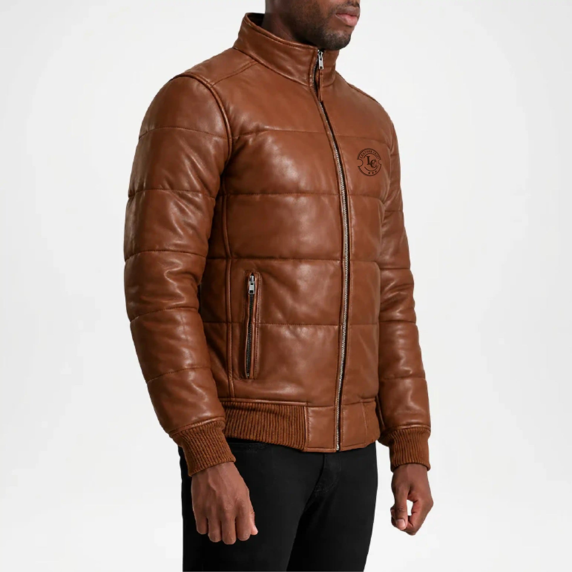Brown leather jacket with quilted design on a white background