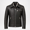 Black textured faux leather jacket with a front zipper, zippered chest pocket, and zippered side pockets, shown on a plain light gray background.
