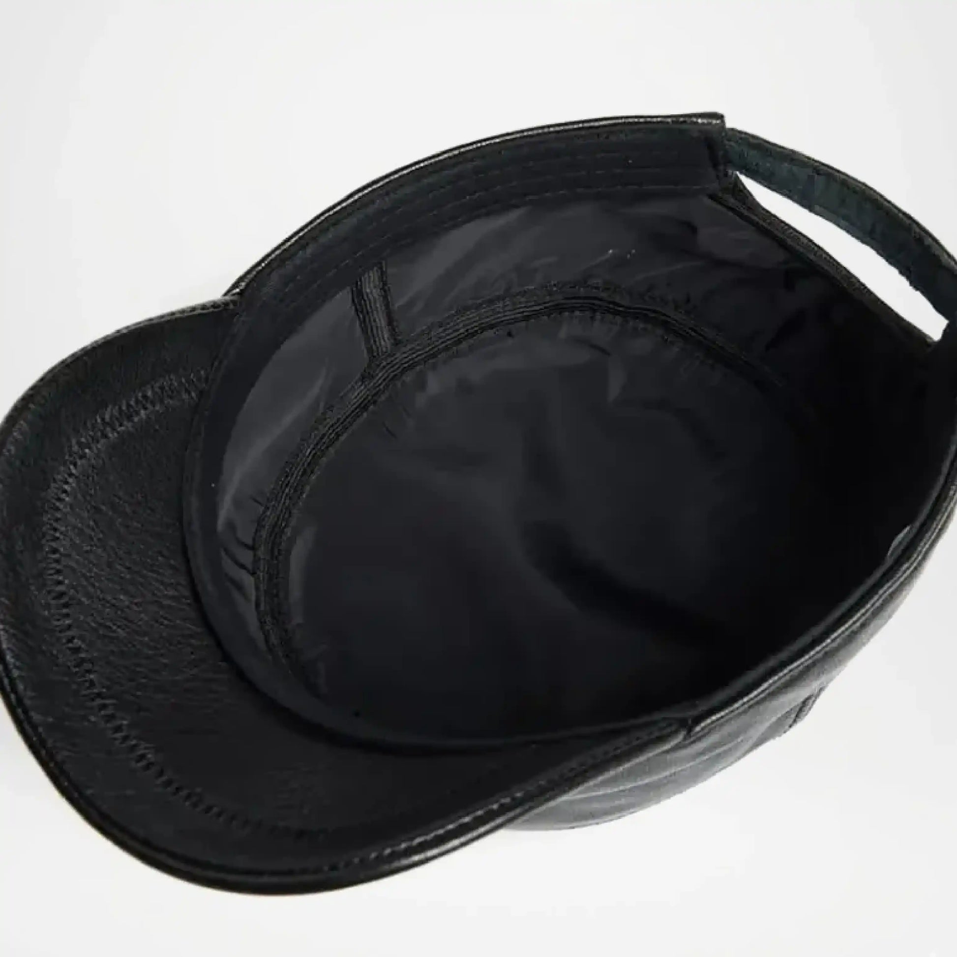 Black leather hat on a white background