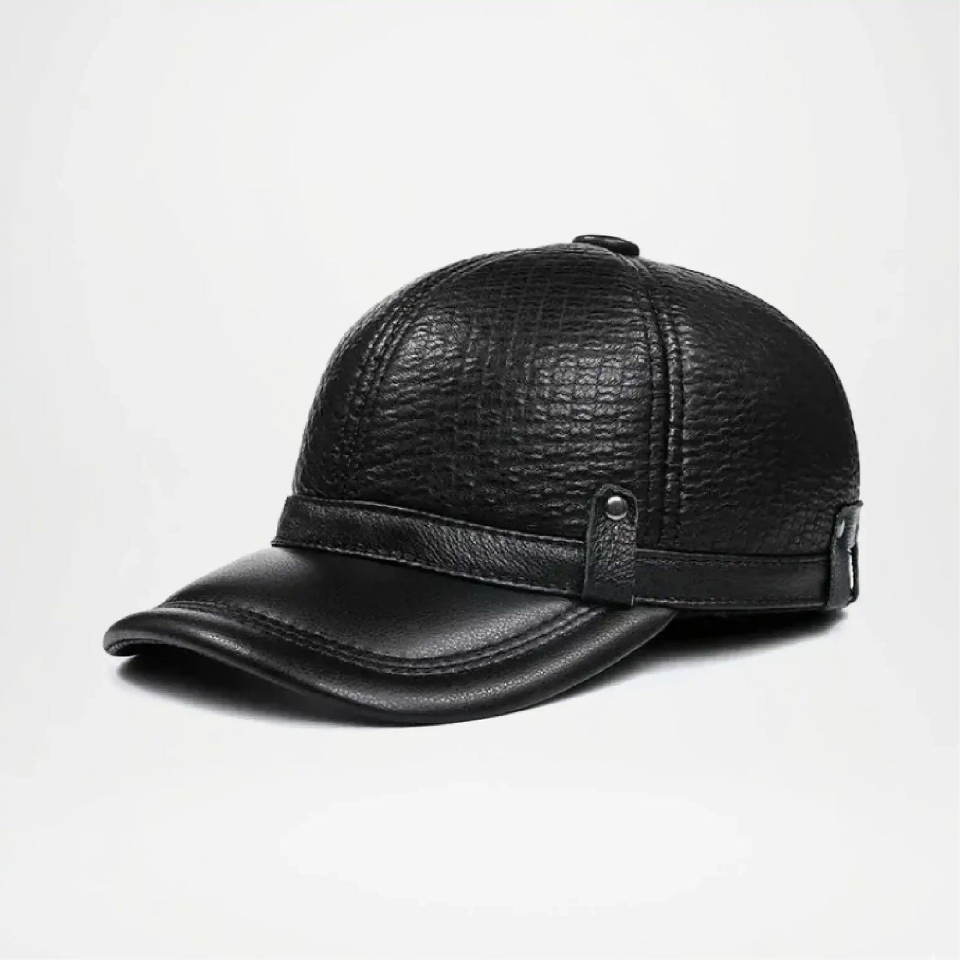 Black leather cap on a light gray background