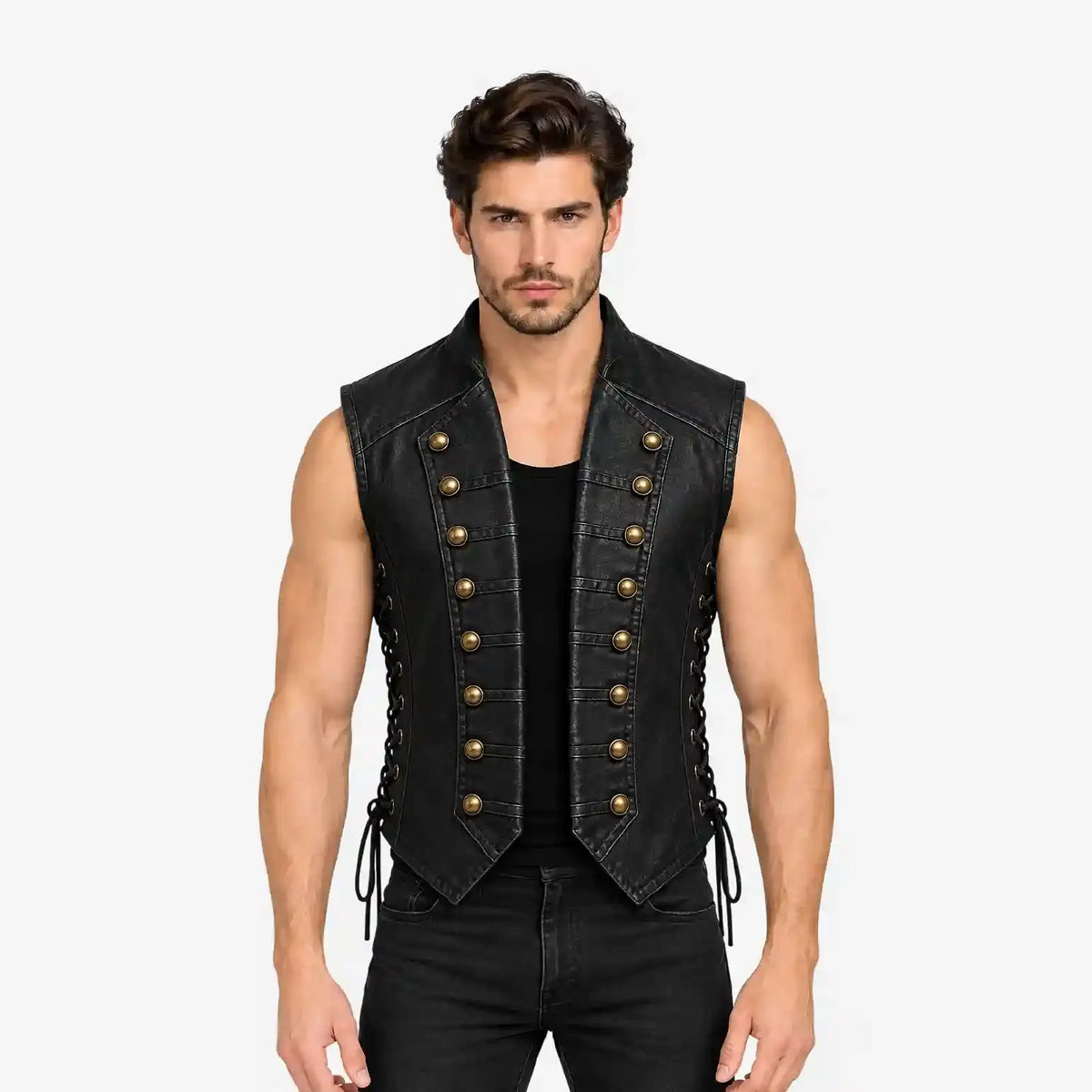 A muscular man wearing a black leather-look sleeveless vest with double rows of gold-tone decorative buttons and side laces, paired with a black shirt and black jeans, against a plain light gray background.