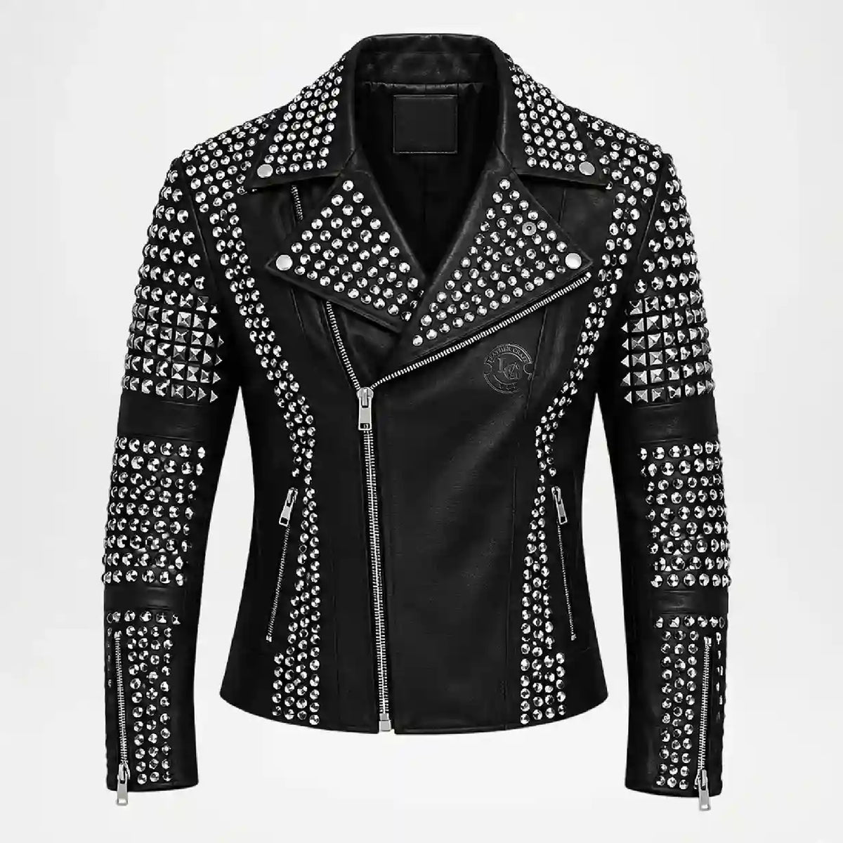 A black faux leather moto jacket heavily embellished with silver studs and pyramid studs, featuring a silver zipper, a pointed collar, and zippered pockets, shown against a plain white background.