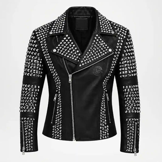 A black faux leather moto jacket heavily embellished with silver studs and pyramid studs, featuring a silver zipper, a pointed collar, and zippered pockets, shown against a plain white background.