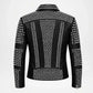 Black leather motorcycle jacket with extensive silver pyramid and round stud embellishments on the back, shown against a plain white background.