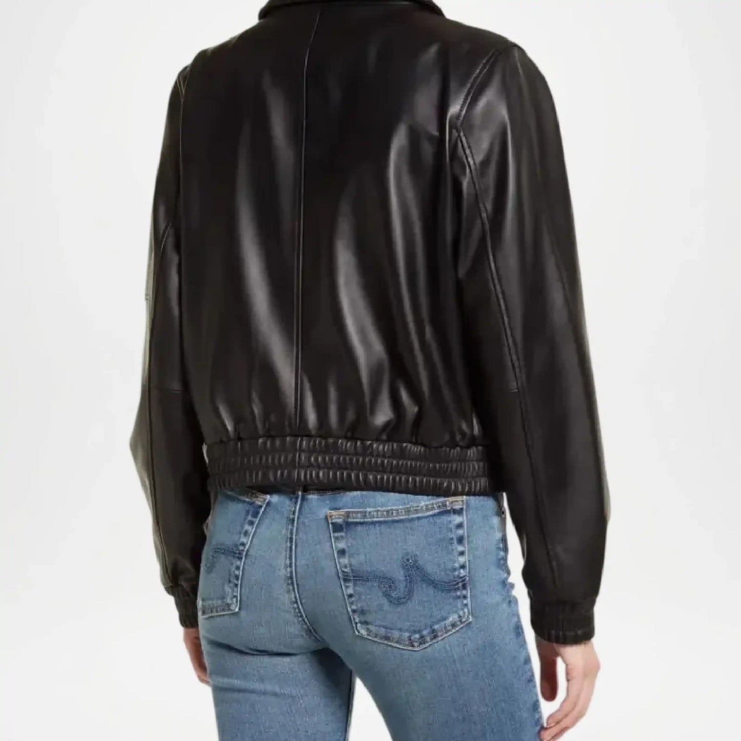 Person wearing a black leather jacket