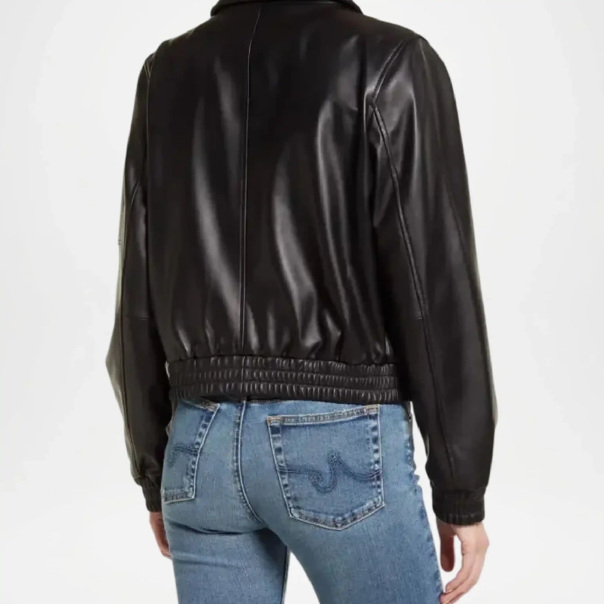 Person wearing a black leather jacket