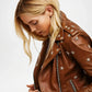 Brown leather jacket with star embellishments