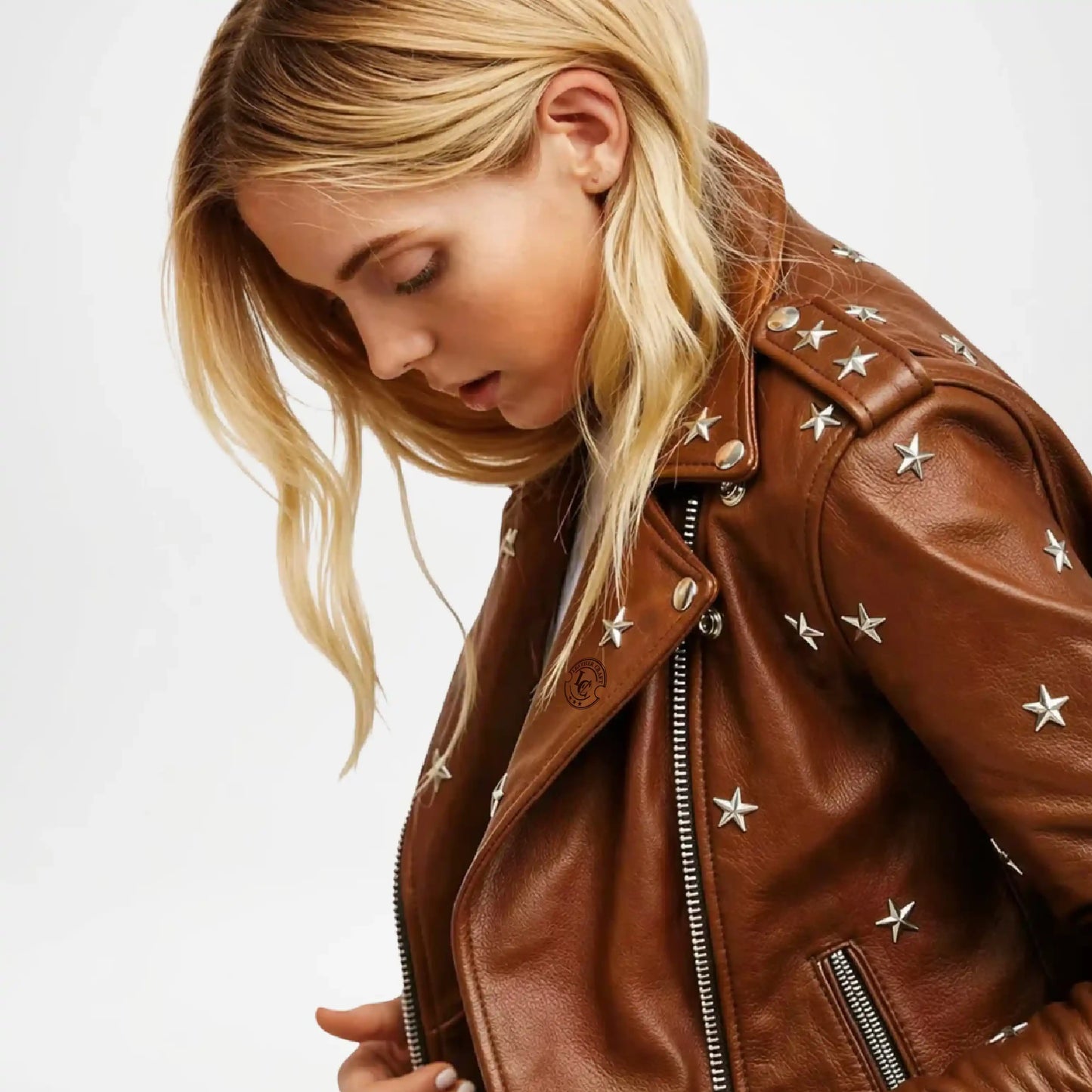 Brown leather jacket with star embellishments