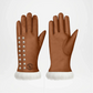 Pair of brown leather gloves with decorative buttons and white fur trim