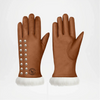 Pair of brown leather gloves with decorative buttons and white fur trim