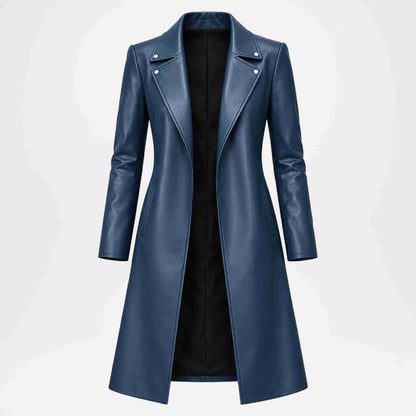 A women's long navy blue faux-leather coat with an asymmetrical lapel and silver snap buttons, displayed on a light gray background.