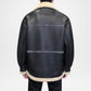 Black leather jacket with beige interior on a white background