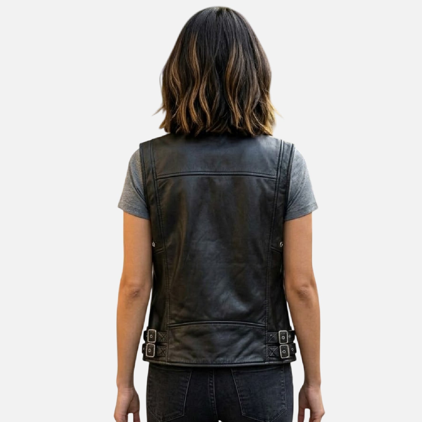 Person wearing a black leather vest back view