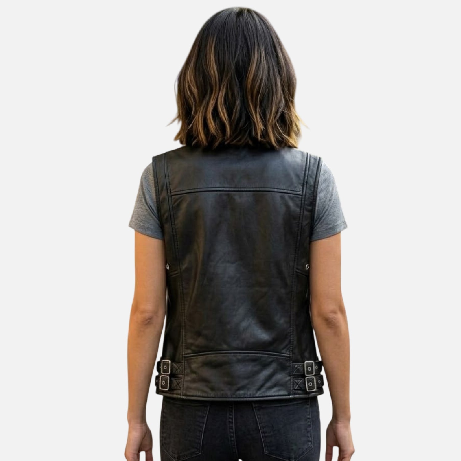 Person wearing a black leather vest back view