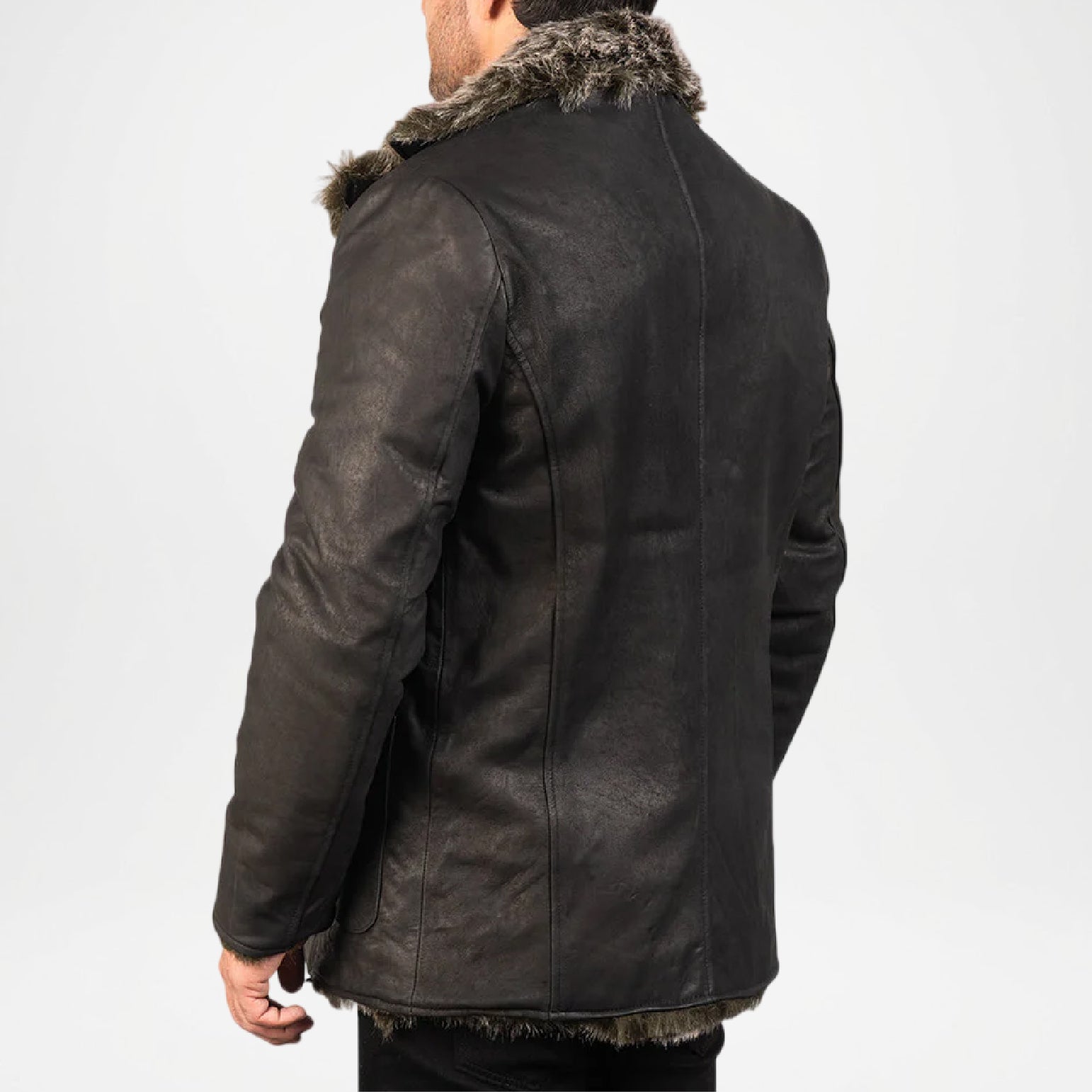 Black leather jacket with fur trim on a white background