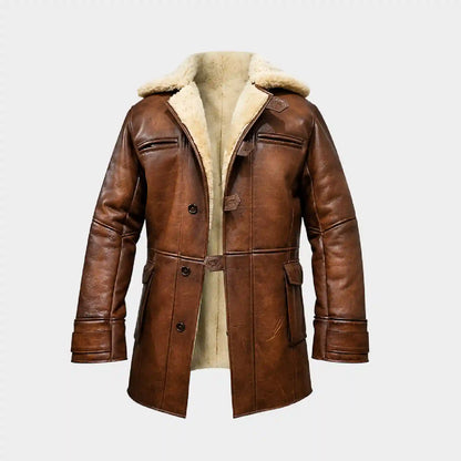 A brown leather aviator-style jacket with a thick cream-colored shearling lining, shown against a plain light gray background.