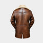 A brown leather jacket with a thick beige shearling-style collar, shown from the back against a light gray background.