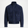 A navy blue suede jacket with a high stand-up collar, snap-button front, ribbed hem and cuffs, and two front flap pockets, shown on a plain light gray background.