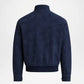 A dark navy blue suede jacket shown from the back, featuring a ribbed knit collar, cuffs, and hem, set against a plain light gray background.