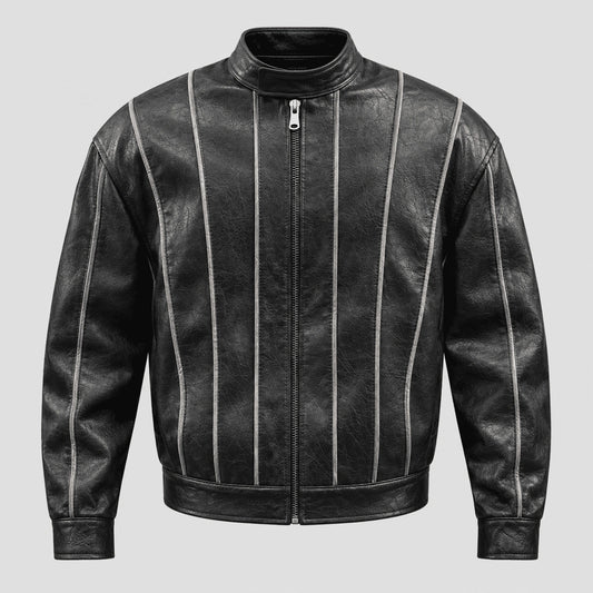 A black leather jacket with vertical silver-toned piping details running down the front, on a solid light gray background.
