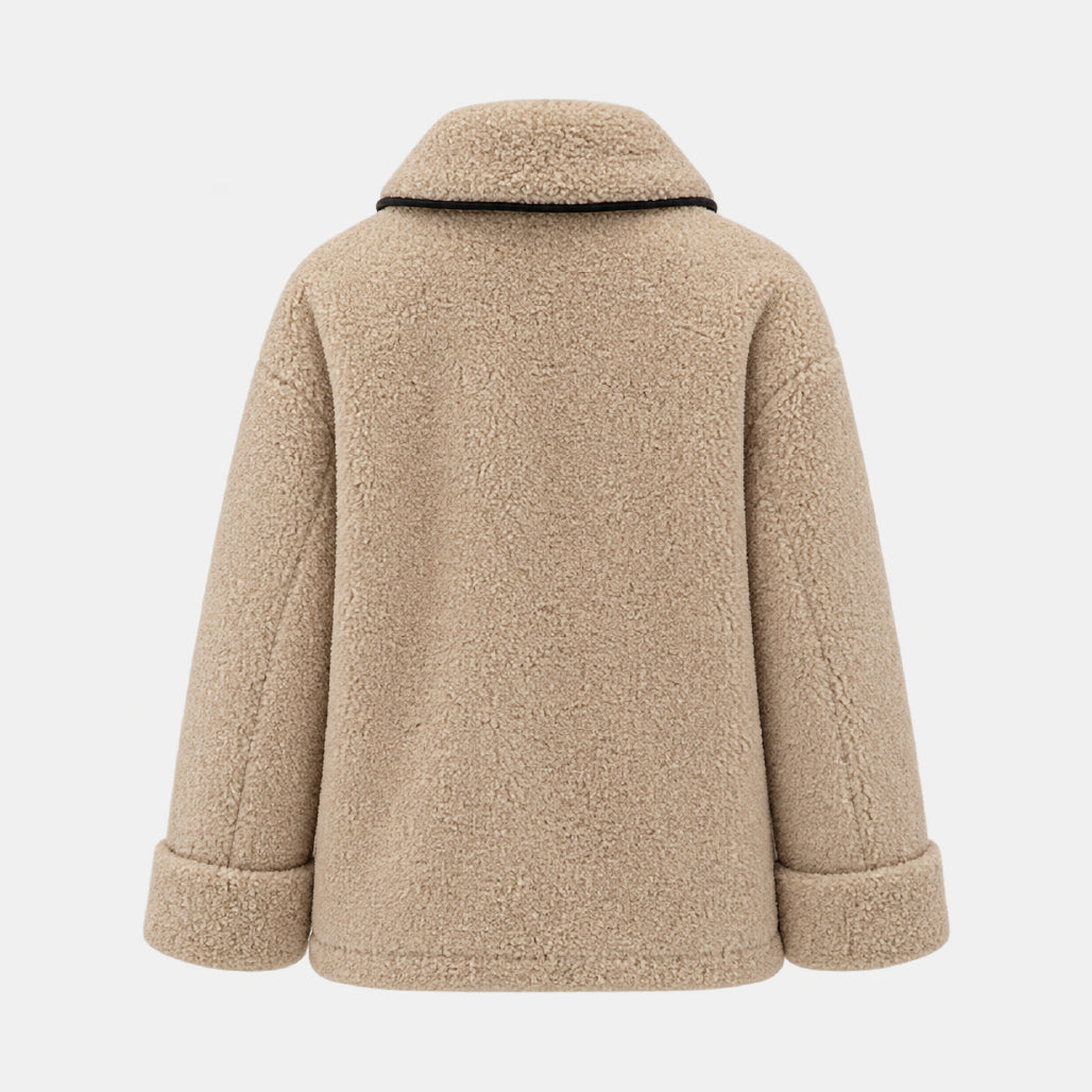 A beige sherpa fleece jacket shown from the back, featuring a high collar with a thin black trim and cuffed sleeves, set against a light gray background.