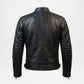 Black leather motorcycle jacket shown from the back, featuring quilted shoulder and elbow protection, a high collar, and zippered hand pockets, photographed against a light gray background.