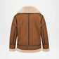 A brown suede shearling jacket shown from the back, featuring a thick beige fleece collar, lining, and cuffs, with dark contrast stitching.